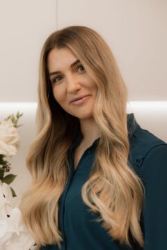 Headshot of Rhiannon Wieck - Front of House / Content Creator